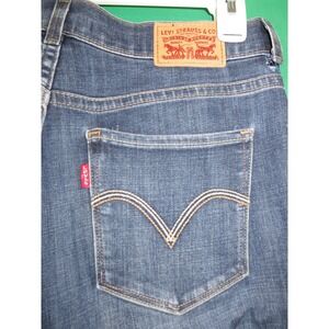 Levis Classic Bootcut Jeans Womens 6 Medium Wash Denim Raw Hem Frayed Blue
